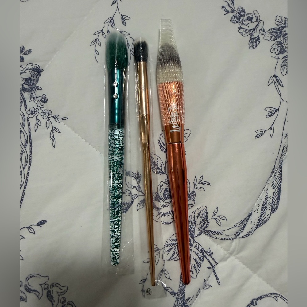 Set of Three Makeup Brushes in Green, Gold, and Copper